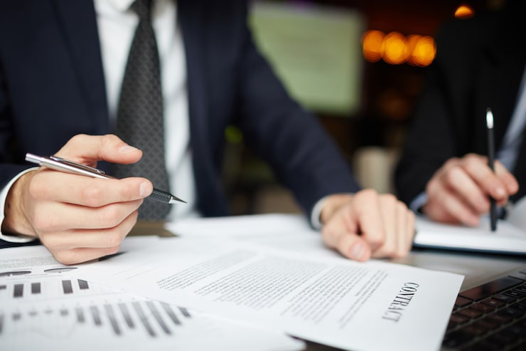 business people signing contract closeup 1098 14236