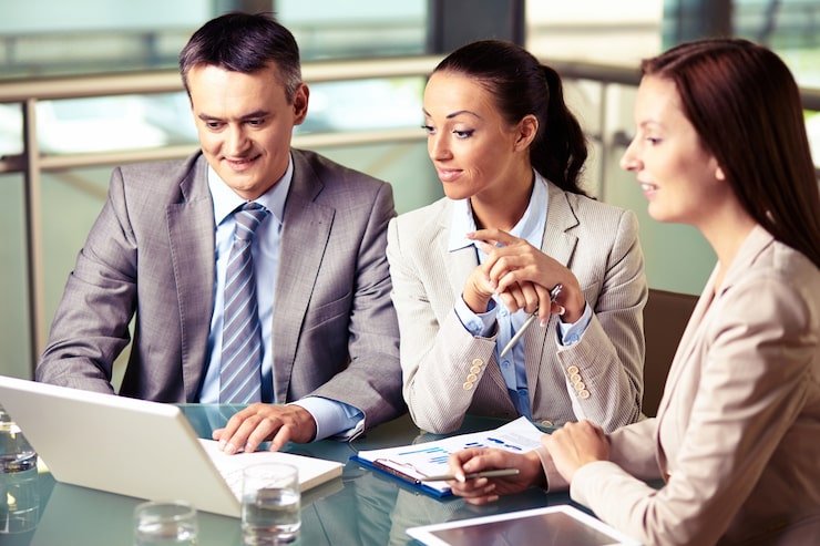 executives discussing project meeting 1098 2035 (1)
