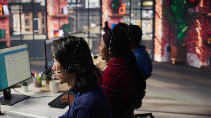 experienced worker talking with customer using headphones mic closeup 482257 126016