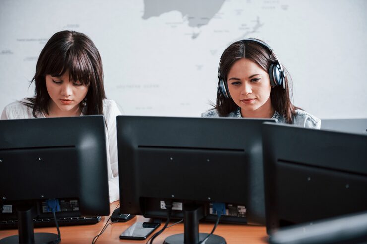 photo two employees young people working call center new deals is coming 146671 16365